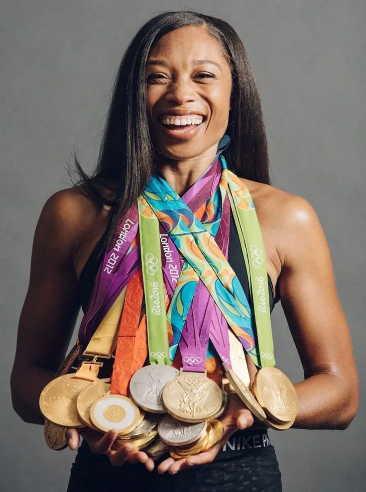 Female athletes winning medals 